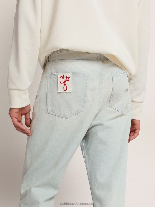 mehed kollektsiooni pleegitatud teksapüksid, mis on hädas kohtlemisegaGolden Goose B6B0T716