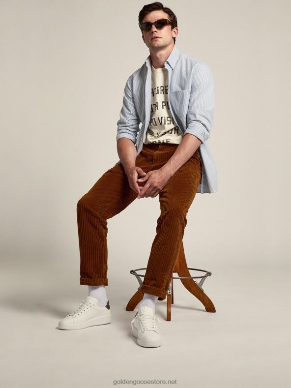 mehed purestari valgest nahast tossud, millel on roheline kanvastGolden Goose B6B0T565