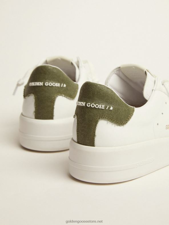 mehed purestari valgest nahast tossud, millel on roheline kanvastGolden Goose B6B0T565
