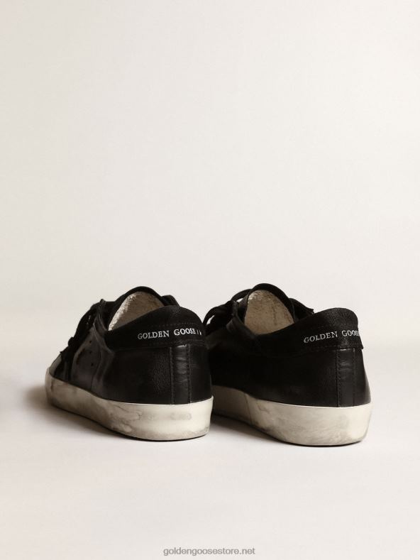 mehed super-star mustast nappast musta seemisnahast tähe ja kontsa sakigaGolden Goose B6B0T658