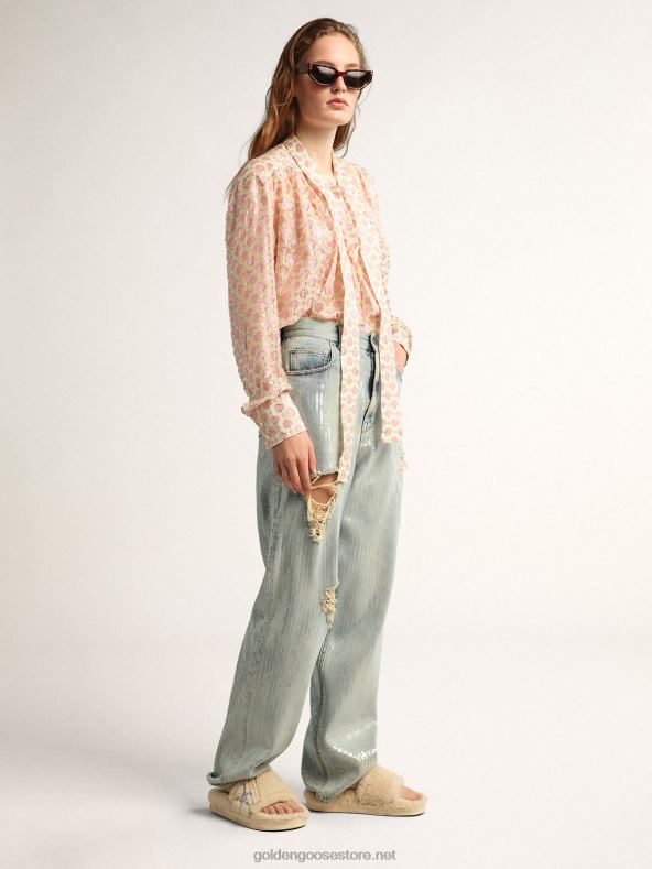 naised matkakollektsiooni teksased, mis on helesinisest helesinisest teksapüksist, millel on üleni litridGolden Goose B6B0T1017