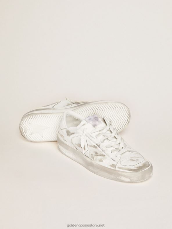 naised Stardani valgest nahast tossud sisseelatud töötlusegaGolden Goose B6B0T254
