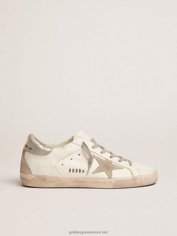 naised ülitähtsad tossud hõbedase kontsaga ja metallist naastudegaGolden Goose B6B0T57