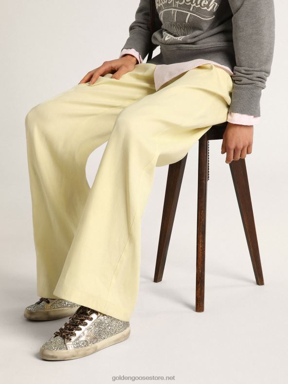 naised plaatinavärvilise säraga superstaari tossud tähega ja kontsaklapiga toon-toonis lamineeritud nahastGolden Goose B6B0T286