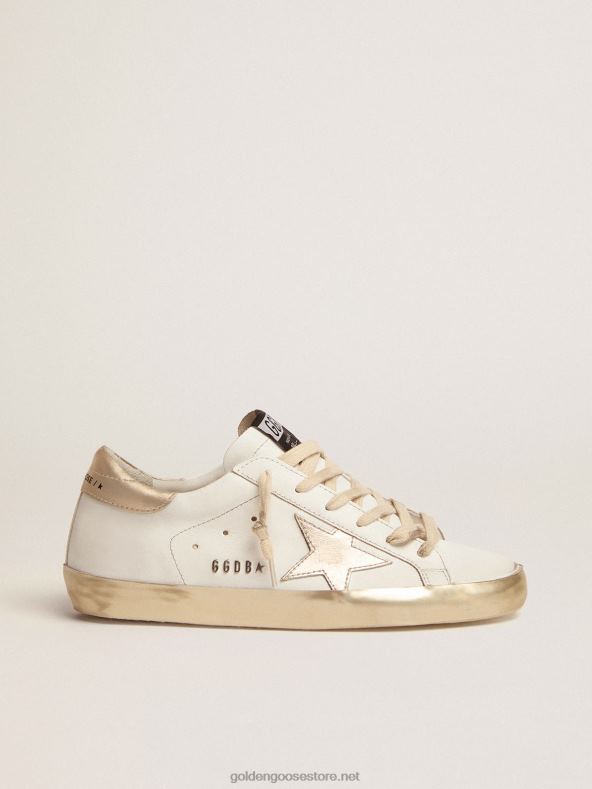 naised super-staar tossud kuldse sädelusega foxing ja metallist stud kirjagaGolden Goose B6B0T60