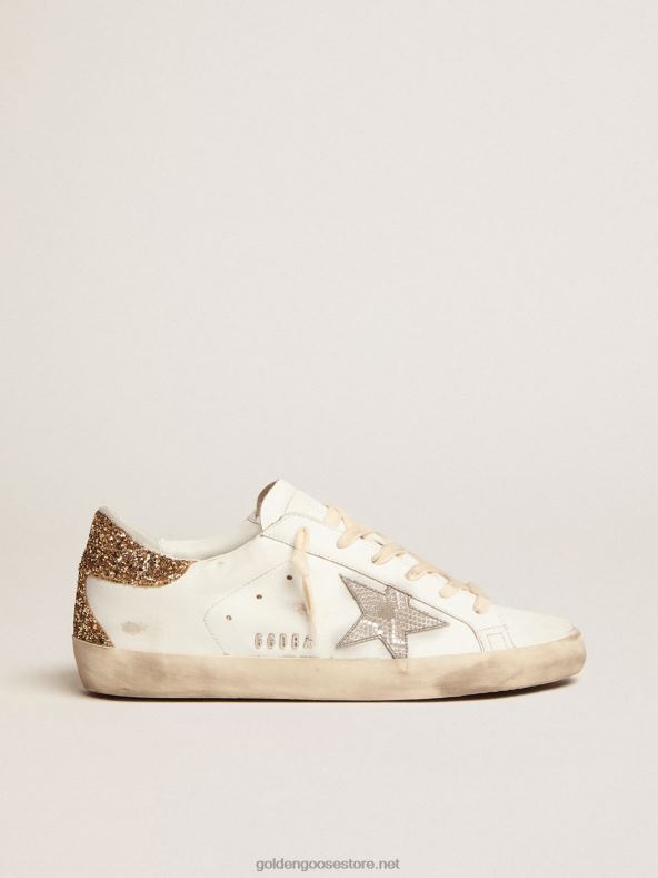 naised super-staar tossud ussimustriga hõbedase nahast tähe ja kuldse sädeleva kontsagaGolden Goose B6B0T6